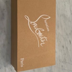 Beautiful barely worn Christian Louboutin mules